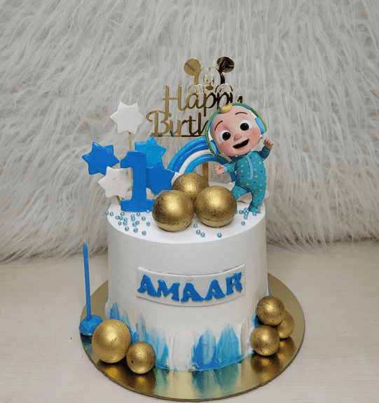 Cocomelon Blue, White and Gold Cake